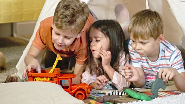 Little Boys And Girl Playing With Toys By Pressmaster VideoHive