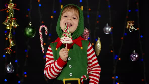 Kid Girl Christmas Elf Santa Claus Helper Costume Licking Candy Lollipop Caramel Sweets alt