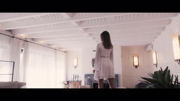 Woman In A Beach House alt