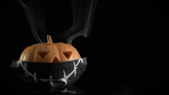 Pumpkin in a protective mask.  alt