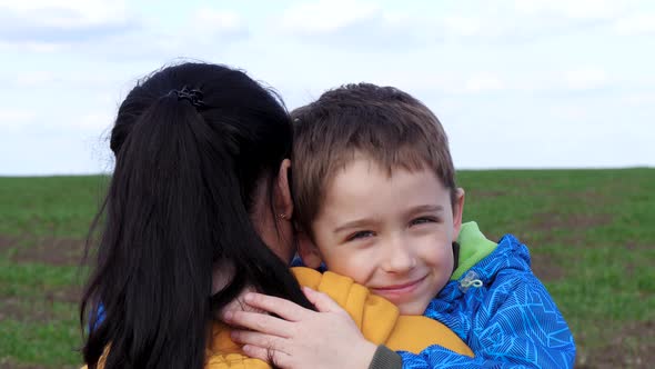 Baby and Mom Embrace alt