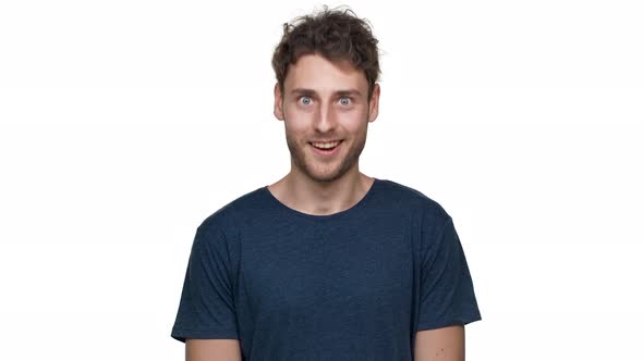 Portrait of Brunette Handsome Guy Having Bristle Nodding and Expressing Approval Isolated Over White alt