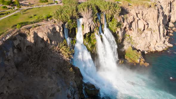 Top View of a High Waterfall Falling Into the Mediterranean Sea. Clean Ecology  alt