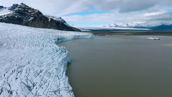 Aerial View of the Glaciers and Snowy Mountains in Iceland alt