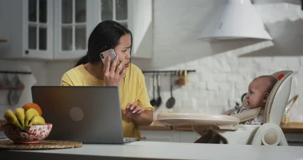 Mother Trying To Work at Home alt