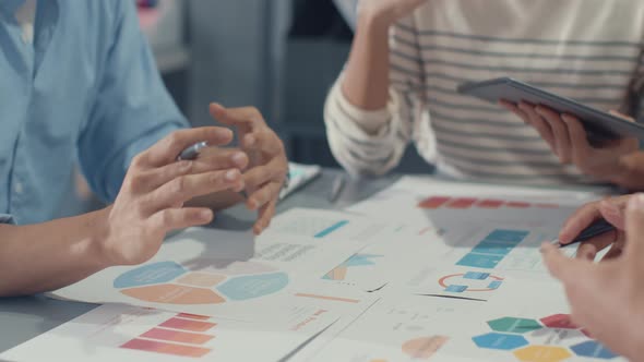 Asia businessmen and businesswomen meeting brainstorming some new ideas about project to his partner alt