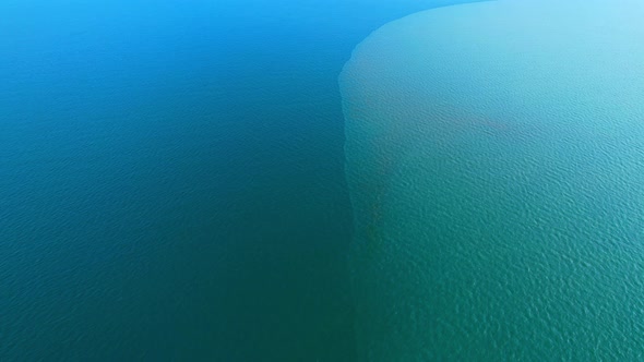 4K Aerial view of drone move on beautiful sea. Flight over ocean, open sea. alt