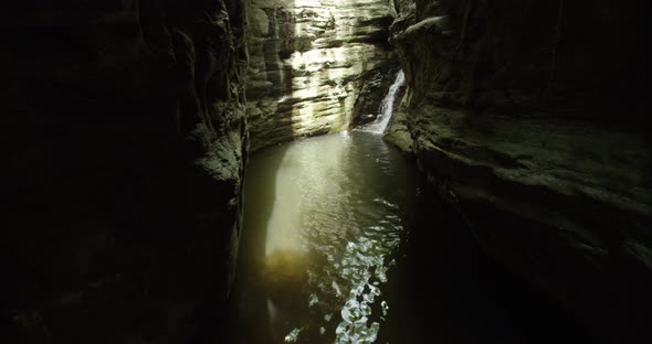 shot of the small waterfall from the rocky mountains