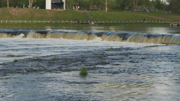 Flying Fish at Ventas Rumba Waterfall. The Widest Waterfall in Europe in Latvia Kuldiga alt