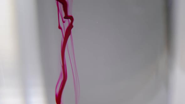 Cinematic Blood Macro Video Shot of White Dye Paint Mixing in Water Liquids Blending Together Ideal alt