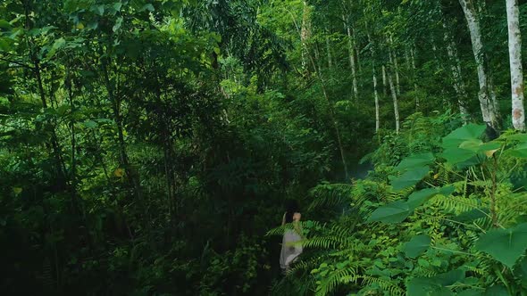 Girl Running On A Forest Path 3