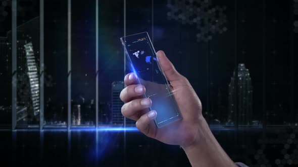 Hand holding futuristic mobile phone against digitally generated background alt