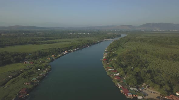 Floating Restaurants and Guesthouses Located on the River Bank