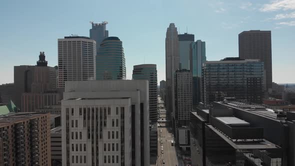Aerial footage downtown Minneapolis, going forward heading to the buildings alt