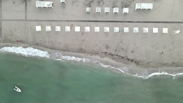 Cargo Ship Standing at Shoal of Sand Beach After Run Aground alt