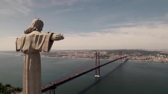 Outstretched arms Cristo Rei, Catholic monument, overlooking Lisbon city alt