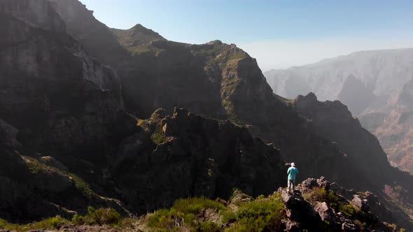 Drone Flying Over Man in the Tropical Mountains of Madeira Island, Portugal