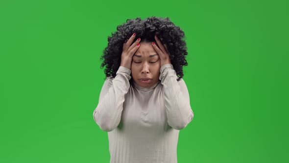 Green Screen Young African Female Showing Worry and Fear