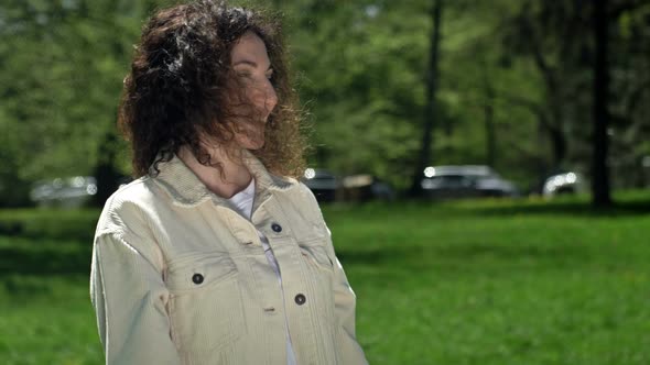 Teenage Girl Gives Her Mother a Large Beautiful Bouquet of Tulips alt