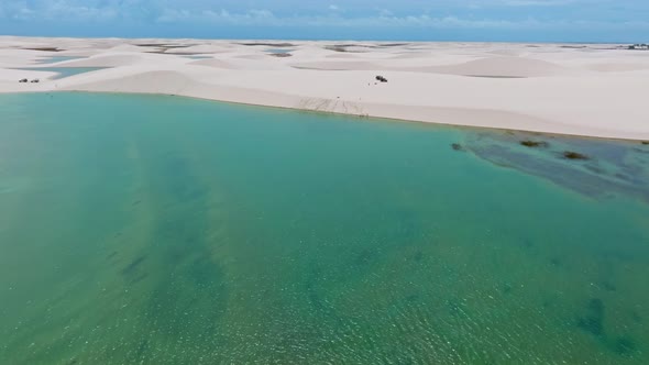 Drone Flies Low Over A Blue Lagoon In A Paradise In Northeastern Brazil