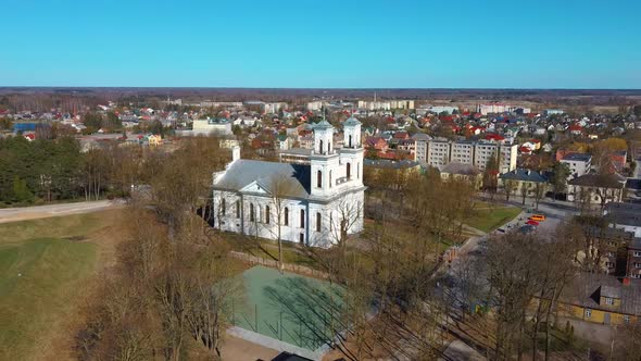 Aerial Shot of Birzai St. John the Baptist Church on the Southern Coast of the Lake Širvėna alt