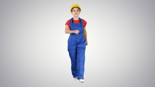 Confident experienced forewoman walking with will to work alt