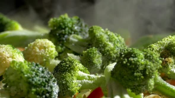 Lunch of Vegetables. Cook the Vegetable Stew in a Pan. Frozen Vegetables on a Salad. Semi-finished