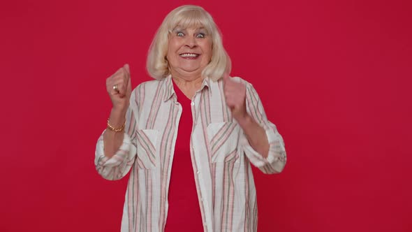 Stylish Senior Old Woman Shouting Raising Fists in Gesture I Did It Celebrating Success Winning alt