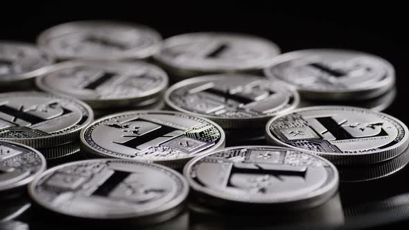 Rotating shot of Bitcoins (digital cryptocurrency) - BITCOIN LITECOIN 461 alt