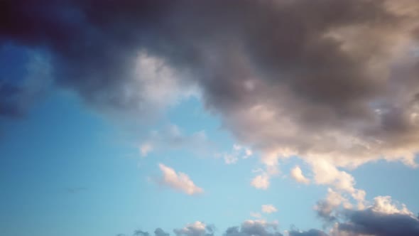 Clouds at Sunset in Fast Movement to the Left in Berlin City alt
