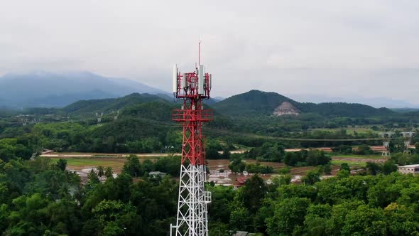 Telecommunication Antenna Tower With 5G And 4G Base Network Aerial View. alt