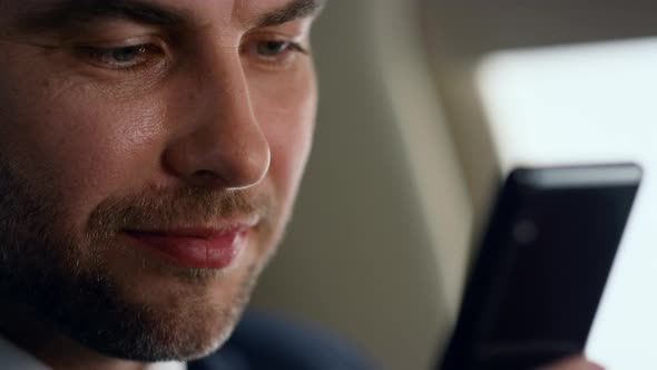 Rich Businessman Using Smartphone Closeup alt