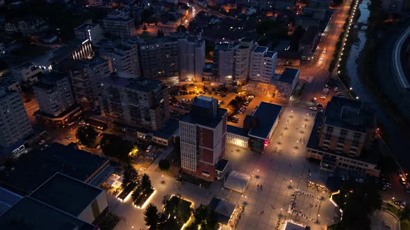 Aerial hyperlapse of Resita city downtown, Romania, shortly after sunset