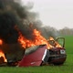 Car On Fire, Burning Car On The Field, Front View - VideoHive Item for Sale
