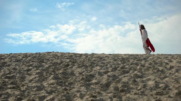 Jesus With Staff Hardly Walking in Sands, Exhausted Ascetic Fasting to Save Soul alt