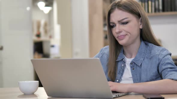 Thumbs Down By Young Girl at Work alt
