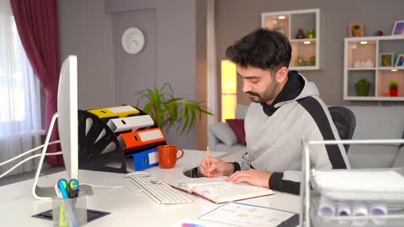 Office worker making video call from computer. alt