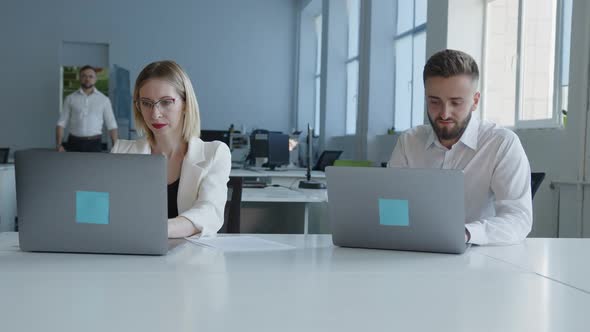 Two Office Workers Do Their Best in an Online Work alt