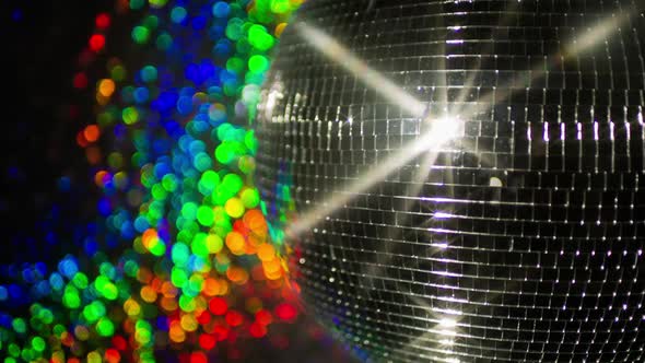 Colourful discoball mirrorball glitterball party disco music club rave alt