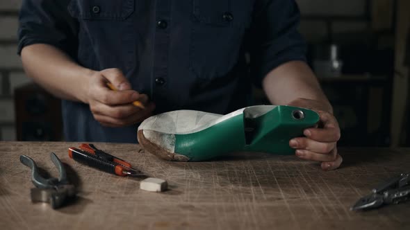 Shoemaker Makes Leather Shoes for Men Sole of Shoe Handmade Craft DIY Process Craftsman Making Boots alt