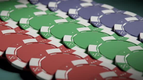 Jackpot. Casino chips in a neat rows on a gaming poker table. Loopable video alt
