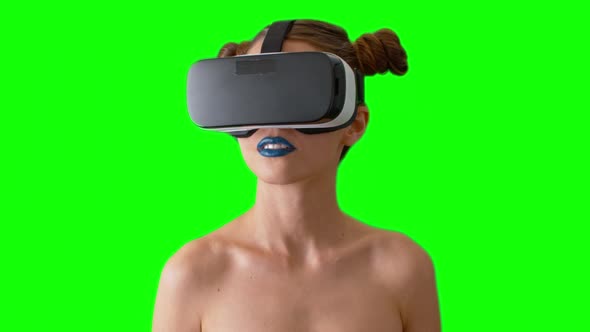 Alien Looking Woman in VR Headset alt
