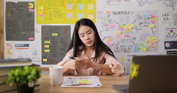 Bored woman worker looking watch alt
