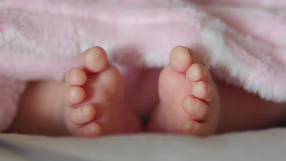 2 Month Baby Feet on the Rocker alt