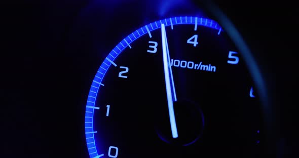 4K - Car acceleration. Tachometer side view alt