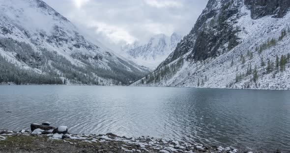 Snow Mountain Lake Timelapse at the Autumn Time alt