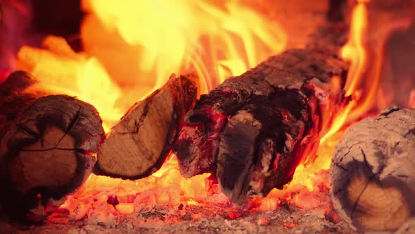 Firewood in oven and fireplace wood. Burning fire, firewood in fireplace alt