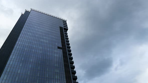 Timelapse Of Clouds Reflected in Office Building