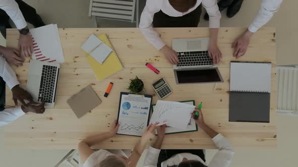 Business people brainstorming at office alt