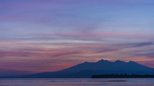 Colorful Timelapse of Daylight Changing in Tropical Island Arounded By Ocean Waves and Cloudscape alt